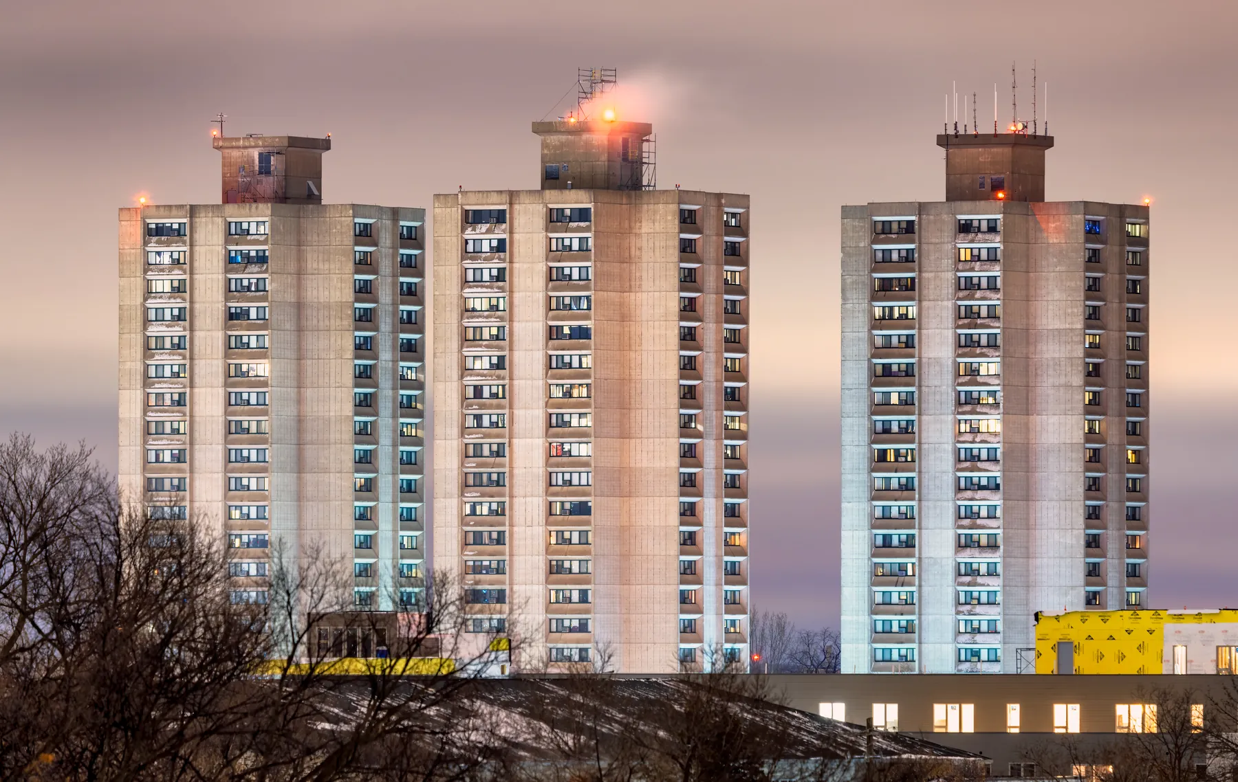 Public housing towers at dusk