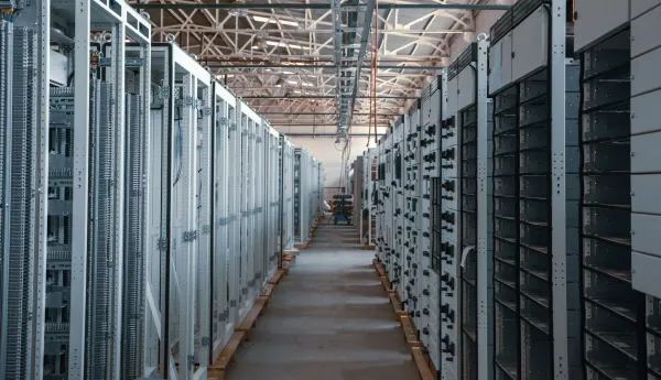 Rows of equipment inside a data center